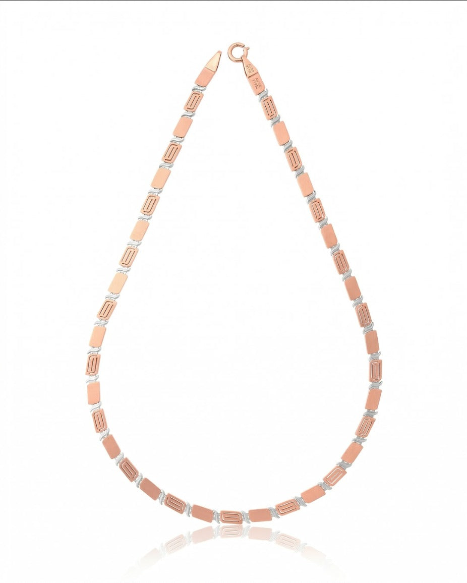 Modernist rose and silver link bracelet by VCJ Bespoke Jewellery, showcasing a sleek design with elegant links.