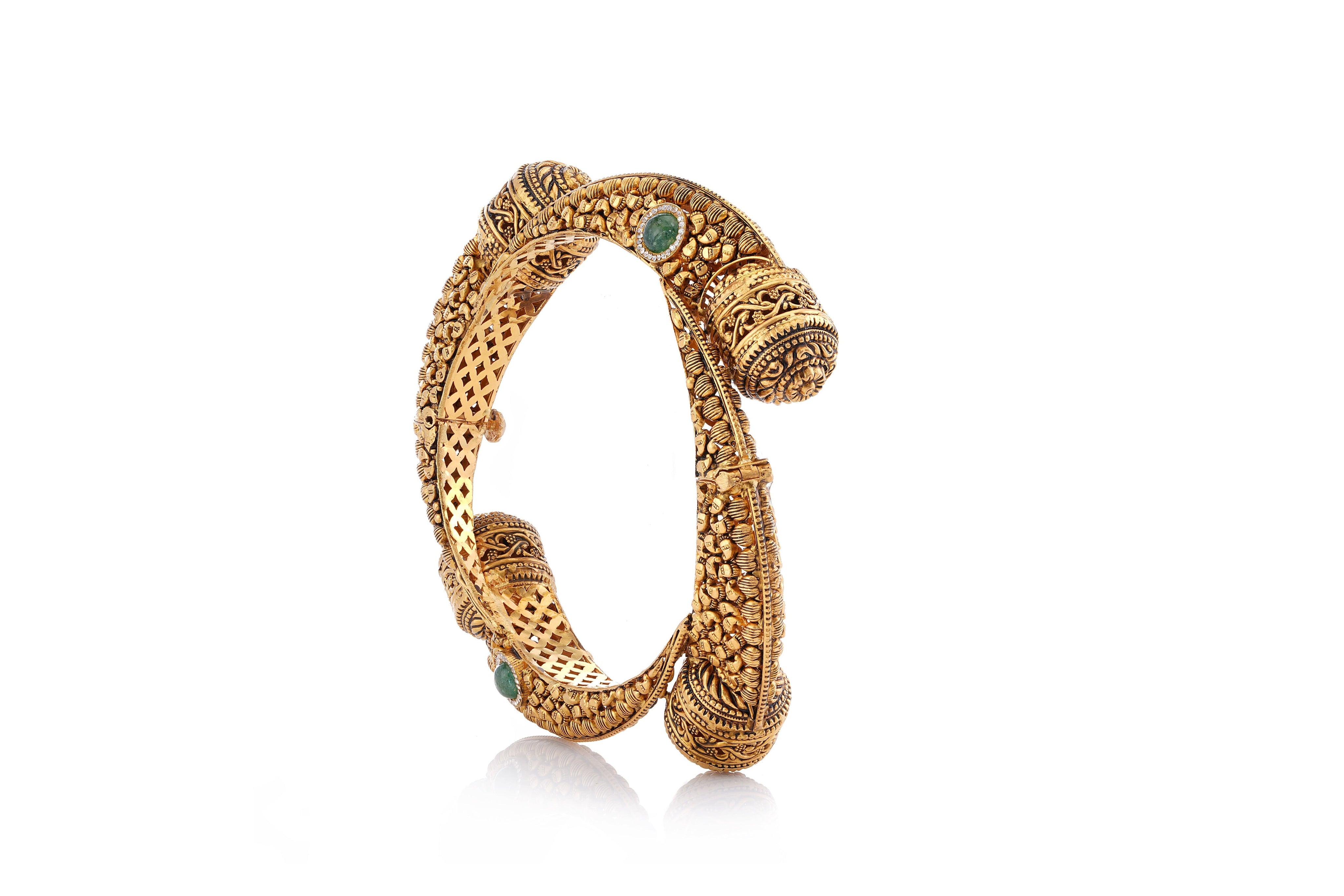 The Sculptural Emerald & Gold Kada